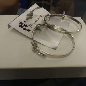 Silver Hoop Earrings with A Cross Embellishment